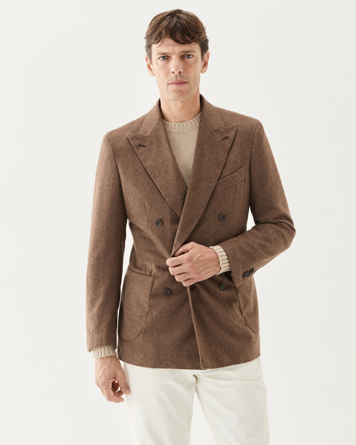 Double Breasted Cashmere Blazer Brown, worn with a beige knit and white trousers