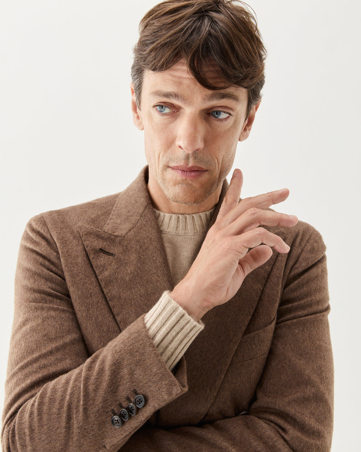 Double Breasted Cashmere Blazer Brown, worn over a beige knit, close-up