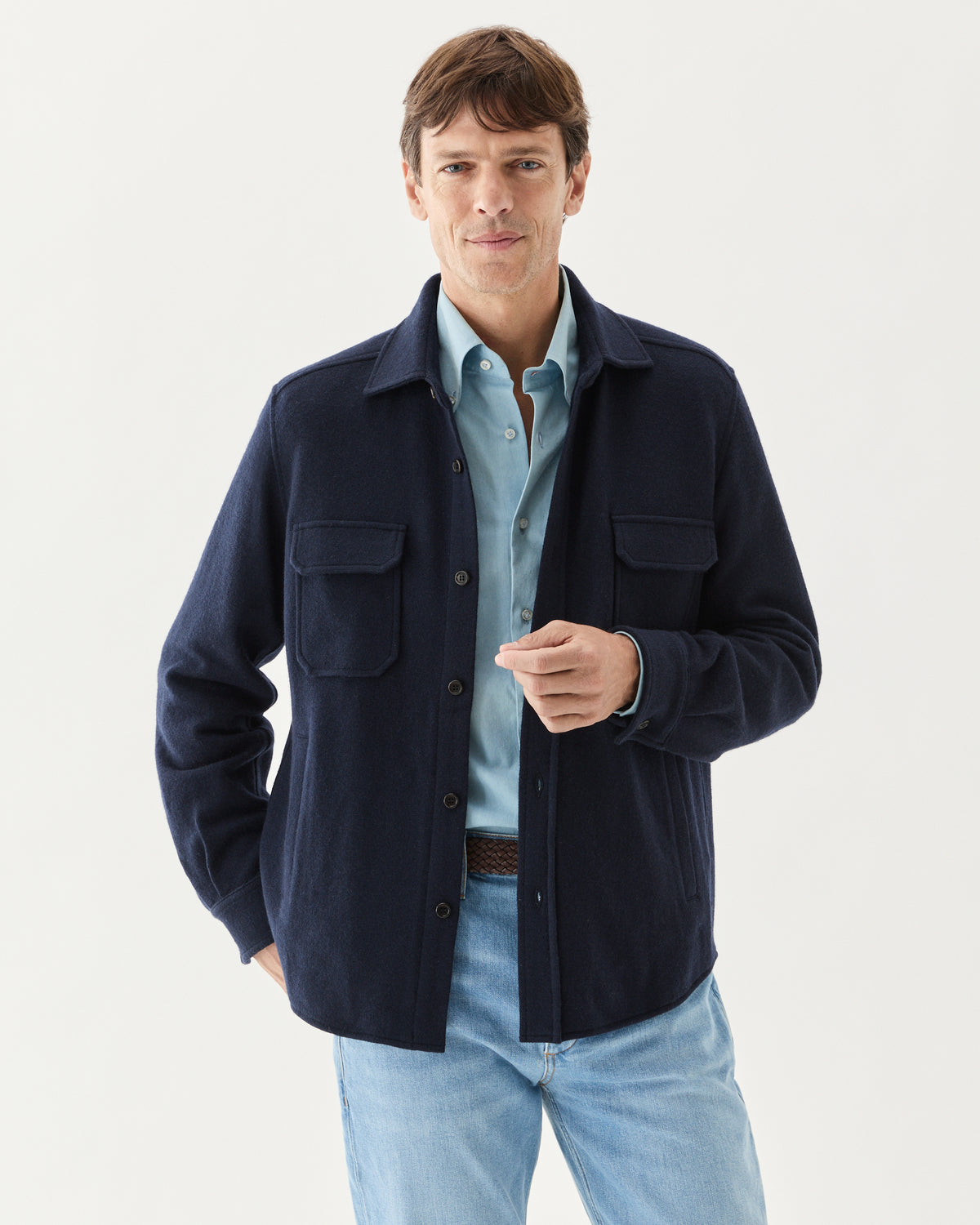 Knitted Wool Overshirt Navy, worn over a light blue shirt with jeans