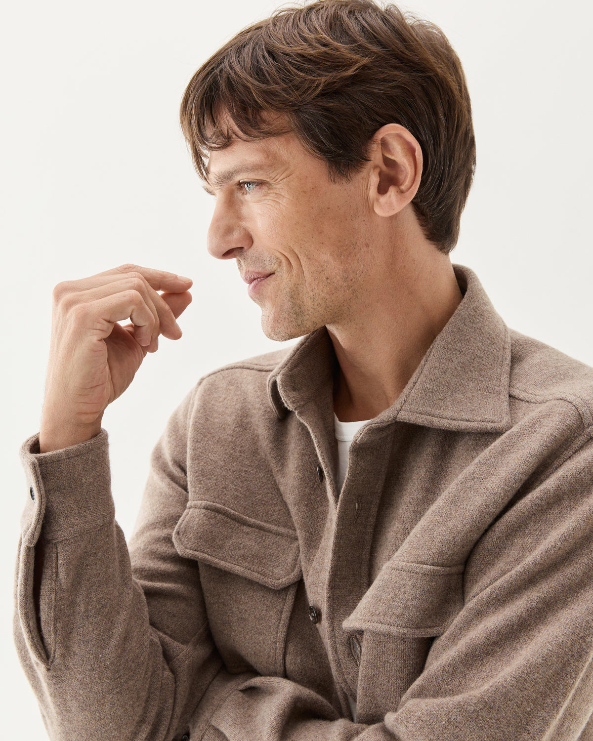 Knitted Wool Overshirt Taupe, worn open over a white T-shirt, close-up