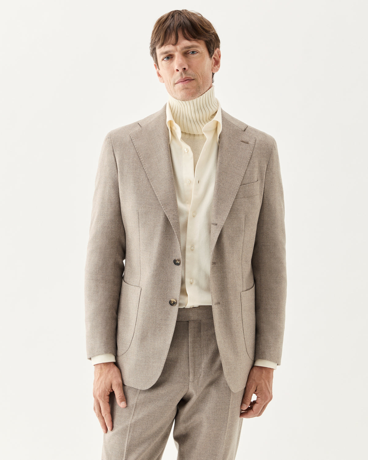 Wool Cashmere Blazer Taupe, worn as a suit with the matching trousers and a cream turtleneck