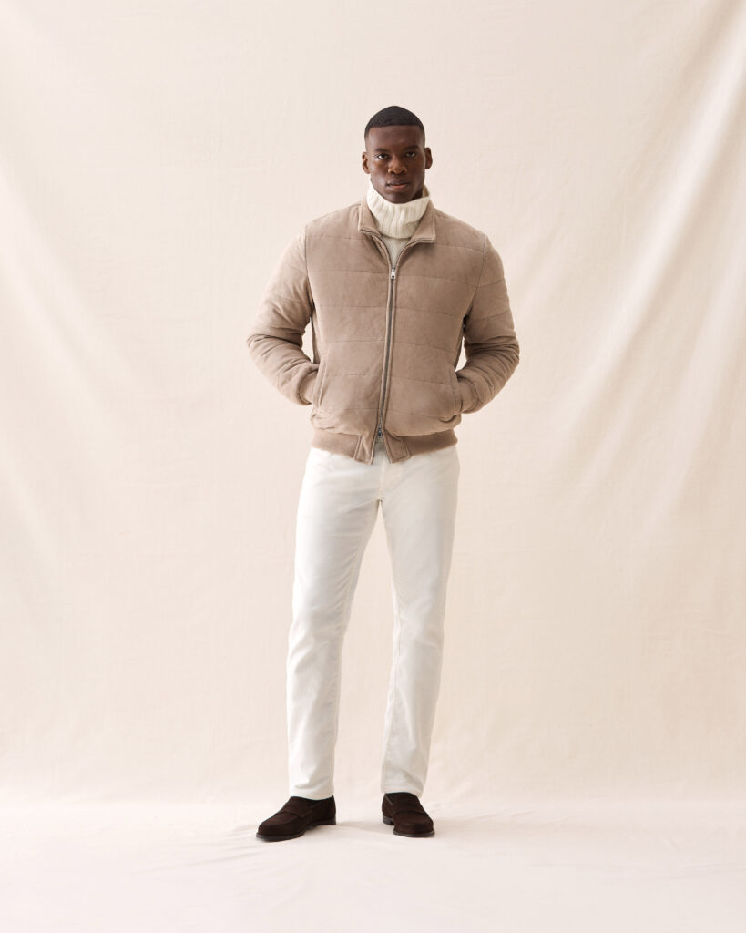 Look combined of our padded, butter soft suede bomber, off-white cashmere roll neck sweater and 5-pocket trousers in 430g moleskin cotton.